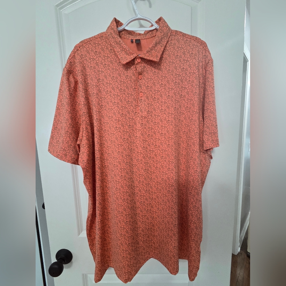 Adidas Men's Orange Floral Polo Shirt.